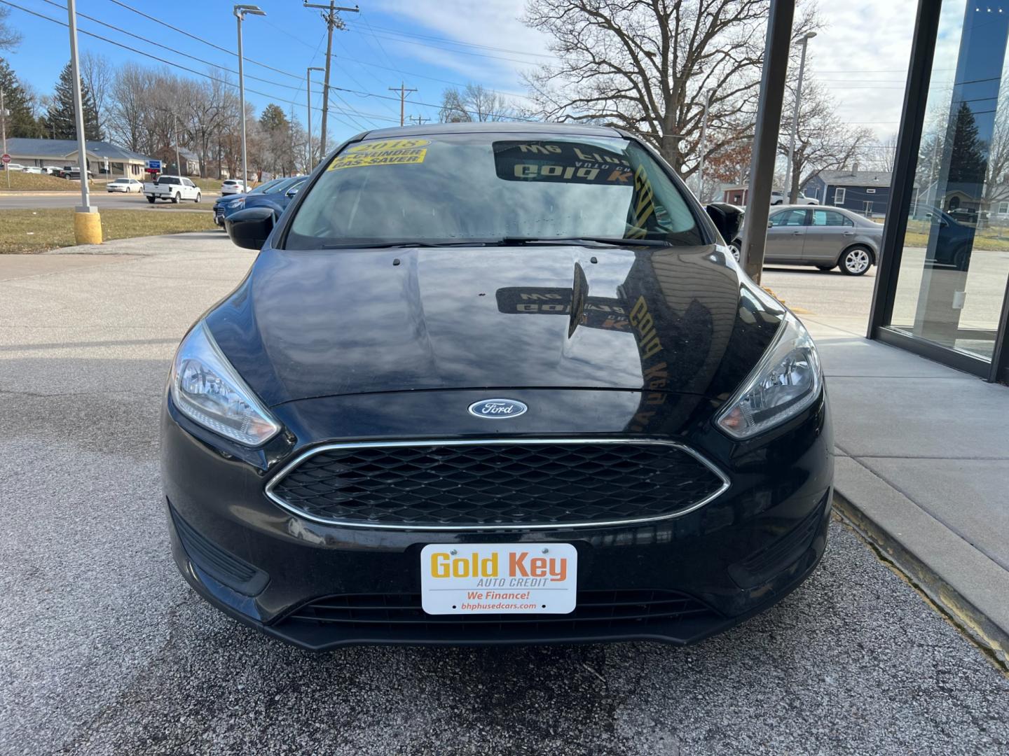 2018 Shadow Black Ford Focus SE Sedan (1FADP3FE7JL) with an 1.0L L3 engine, located at 1633 W Kimberly, Davenport, IA, 52806, (563) 323-5341, 41.559456, -90.598732 - Photo#2